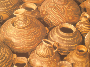 Close up photo of neolithic ceramic vases and containers