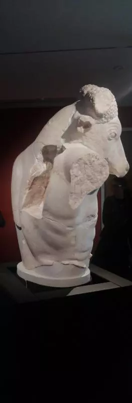 Photo of a broken marble statue of the minotaur